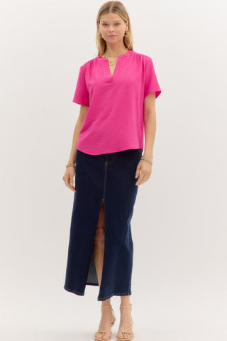 Bright Pink Top with Short Sleeves, V-Neck Cut, Lightweight Material, and Vibrant Color