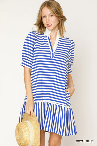 Blue and white striped dress with a notched neckline, puff sleeves, and a tiered ruffle hem.