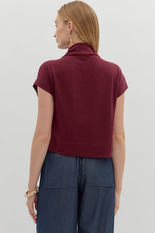 Solid knit mock neck pullover top. Unlined. Knit. Non-sheer. Lightweight.