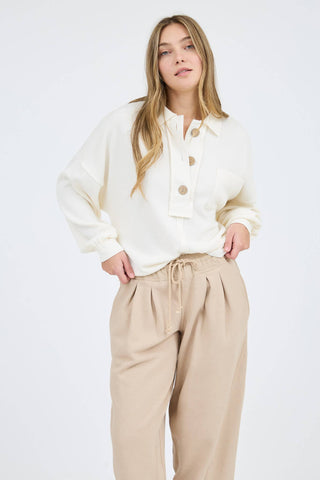 COLLARED SPLIT NECK BUTTON DOWN CHUNKY BUTTON EXTENDED SHOULDER LONG SLEEVES RELAXED FIT RAW EDGE