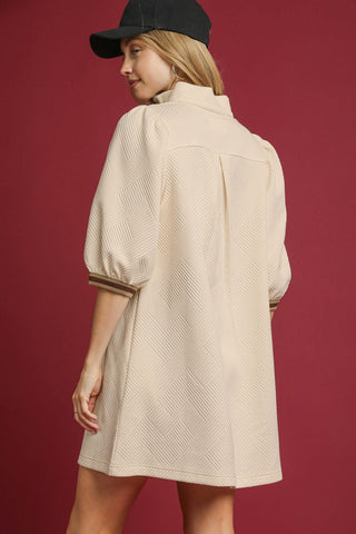 High Neck Jacquard Mini Dress with 3/4 length puff sleeves, High collar with contrast trim, and pockets. Unlined.