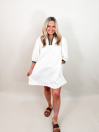 High Neck Jacquard Mini Dress with 3/4 length puff sleeves, High collar with contrast trim, and pockets. Unlined.