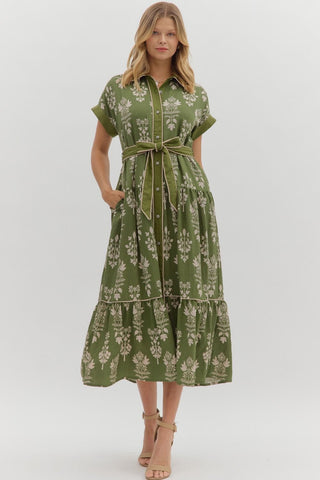 Botanical pattern faux roll-up sleeve band midi dress featuring striped accent piping trim inset. Collar button closure at front with removable belt. Side pockets. Lined. Woven. Non-sheer. Lightweight.