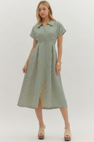 Striped short sleeve midi dress featuring shirt collar, pleated waist seam. Side pockets. Button closure at front. Zipper at side. Lined. Woven. Non-sheer. Lightweight.