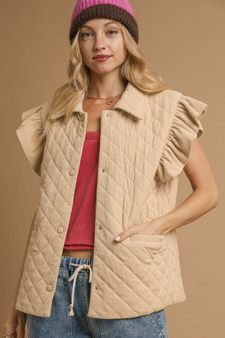 Corduroy Quilted Ruffle Sleeve Vest with Diamond quilt pattern, Ruffle cap sleeves, Front snap button closure, and Side slip pockets. Lined