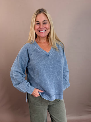 V NECKLINE LONG SLEEVES EXTENDED SHOULDER EXPOSED SEAM PATCHWORK DETAIL WASHED KNIT TOP