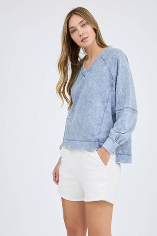 V NECKLINE LONG SLEEVES EXTENDED SHOULDER EXPOSED SEAM PATCHWORK DETAIL WASHED KNIT TOP