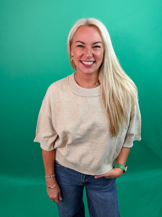 Solid sweater knit ¾ wide sleeve pullover. Unlined. Knit. Non-sheer. Lightweight.