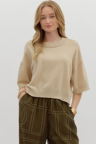 Solid sweater knit ¾ wide sleeve pullover. Unlined. Knit. Non-sheer. Lightweight.