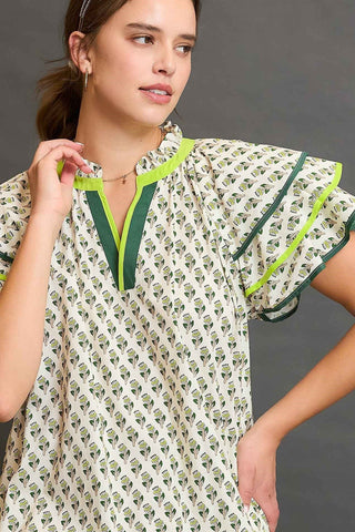 Mini Dress with floral print, flutter sleeves, tiered skirt, v-neckline, and contrast border trim