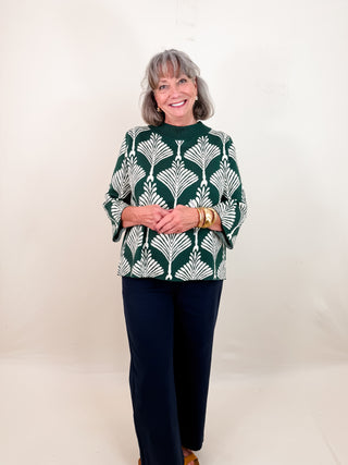 Green and White Abstract Pattern Sweater with Mock Neckline, Boxy Silhouette, and Three Quarter Wide Sleeves