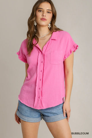 Vibrant pink button up top with short ruffle sleeve and frayed hem.