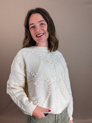 ROUND NECKLINE CREW NECKLINE DROP SHOULDER EXTENDED SHOULDER RELAXED FIT HEART PATTERN CABLE KNIT PATTERN SOLID NOT LINED KNIT PULLOVER SWEATER