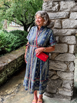 Linear floral pattern short short sleeve pleated ruffle neck band button closure shirt midi shirt featuring contrast accent inset detail. Removable belt. Side pockets. Lined. Woven. Non-sheer. Lightweight.