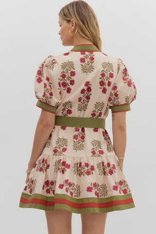 Floral pattern short puff sleeve ruffle hem mini dress featuring multicolor accent band detail. V-neck band collar button closure. Removable belt. Side pockets. Lined. Woven. Non-sheer. Lightweight.
