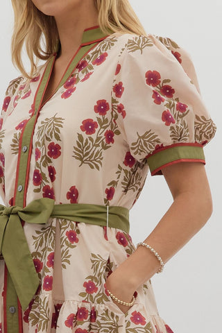 Floral pattern short puff sleeve ruffle hem mini dress featuring multicolor accent band detail. V-neck band collar button closure. Removable belt. Side pockets. Lined. Woven. Non-sheer. Lightweight.