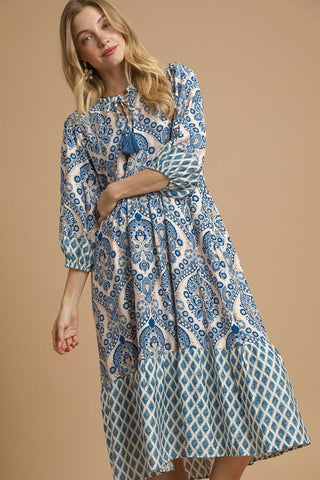 Midi Dress with Blue Crosspatch Patten, Including Paisley Print, Tiered Hem, 3/4 Puff Sleeves, and Split Neckline with Tassel Tie Detail