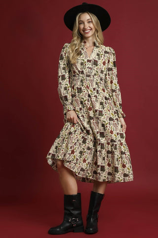 Floral Midi Dress with Smocked Waist with V-neckline, Ruffle collar trim. Long sleeves with ruffle elastic cuffs, and Smocked waist. Lined.