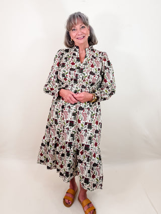 Floral Midi Dress with Smocked Waist with V-neckline, Ruffle collar trim. Long sleeves with ruffle elastic cuffs, and Smocked waist. Lined.