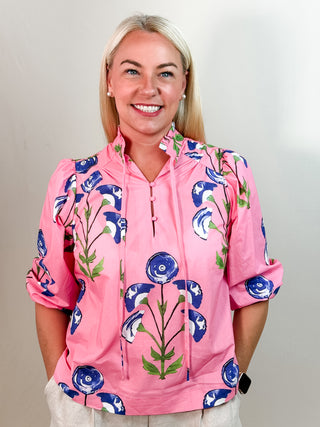 Pink Floral Blouse with 3/4 Puff Sleeve, Split Neckline with Tie Detail, and Large Blue Floral Pattern