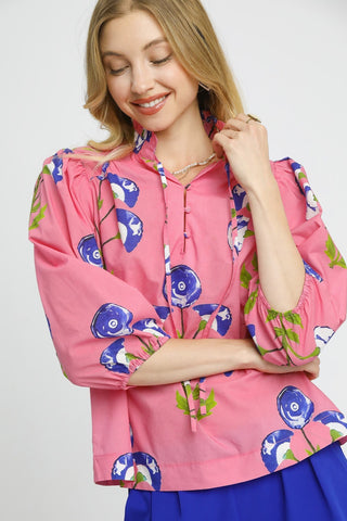 Pink Floral Blouse with 3/4 Puff Sleeve, Split Neckline with Tie Detail, and Large Blue Floral Pattern