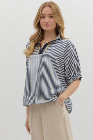 Stripe pattern high neck elasticated sleeve band dolman top featuring accented multicolor rib band split neck. Unlined. Woven. Non-sheer. Lightweight.