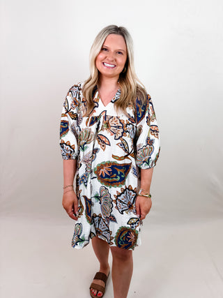 Cream Babydoll Dress with V-Neckline, Three Quarter Puff Sleeves, and Multicolor Paisley Floral Print