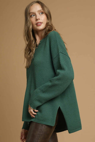 Textured Button Henley Knit Sweater with Notched Neckline with Front Button Detail and High-Low Hemline with Side Slits. Unlined.