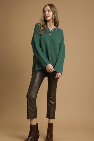 Textured Button Henley Knit Sweater with Notched Neckline with Front Button Detail and High-Low Hemline with Side Slits. Unlined.