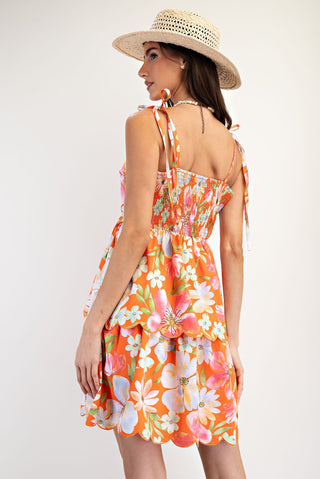 Orange Mini Dress with Floral Print, Scallop Edged Tiered Layered Skirt, Adjustable Tied Straps, and Smocked Back