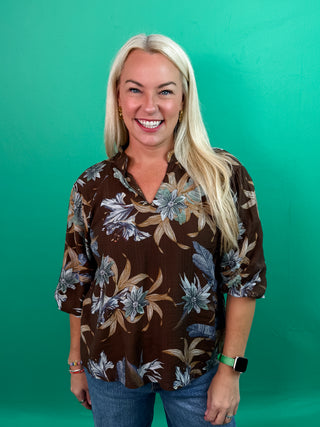 Floral Print Sheer V-Neck Blouse with V-Neckline with Soft Pleating, Three Quarter Puff Sleeves, High-Low Hemline and Smocked Collar