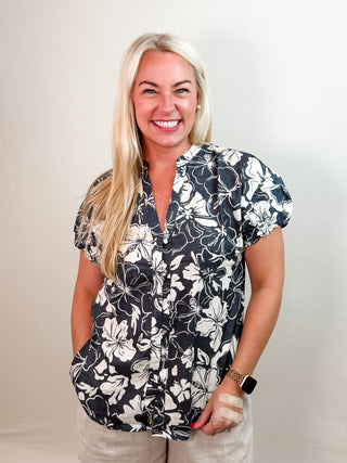 Black and White Floral Print Top with Puff Sleeves, Button Closure, and V-Neck