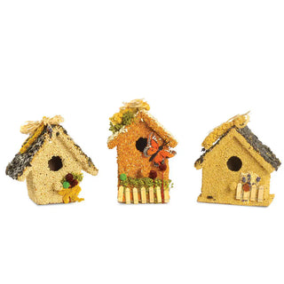 Three decorative birdhouse shaped bird feeders with a white background