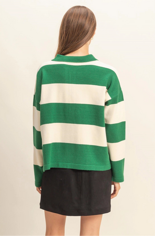 Vibrant green and white striped knit sweater with front button closure and collar. 