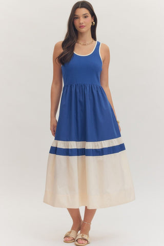Solid sleeveless midi dress featuring scoop neck and contrast trim detail. Gathered waist. Contrast hem panel. Lined. Knit. Non-sheer. Lightweight.