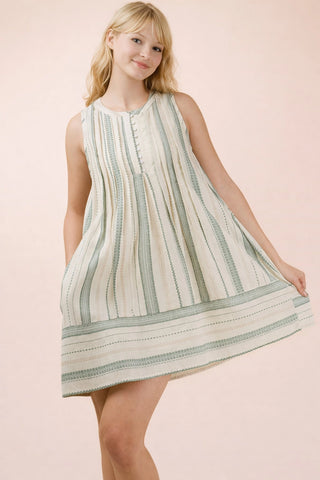 Sleeveless Striped Pintuck Detail Woven Mini Dress with Half Button Down and Round Neckline. Lined.