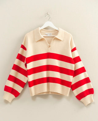 Red and cream striped knit sweater with front button closure, collar, and cuffed sleeves. Vibrant and Cozy. 