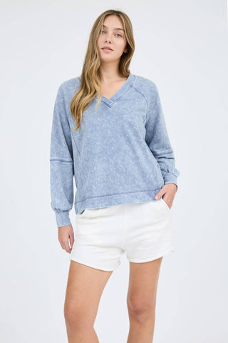 V NECKLINE LONG SLEEVES EXTENDED SHOULDER EXPOSED SEAM PATCHWORK DETAIL WASHED KNIT TOP