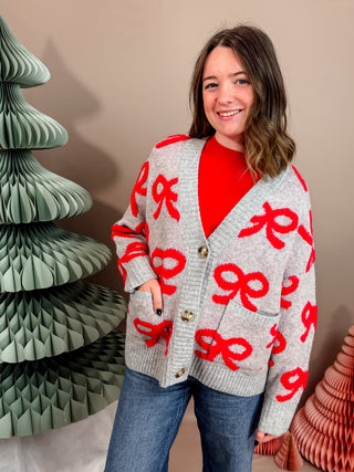 V NECKLINE LONG SLEEVES DROP SHOULDER EXTENDED SHOULDER RELAXED FIT OVERSIZED BOW JACQUARD PATTERN KNIT CARDIGAN SWEATER WOOL BLEND.