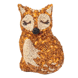 Fox-shaped bird feeder made of seeds on a white background