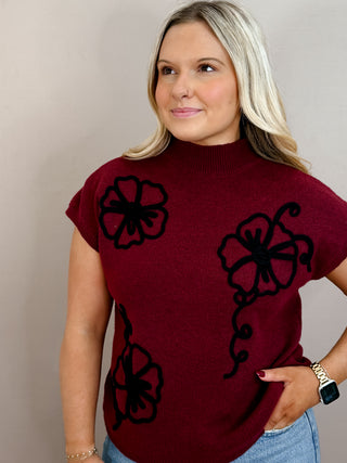 MOCK NECKLINE SLEEVELESS DROP SHOULDER CONTRAST FLORAL TRIM KNIT PULLOVER SWEATER