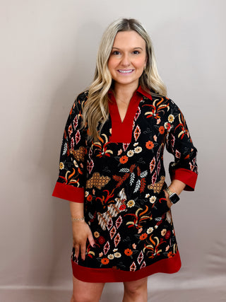 Paisley print mini dress with three quarter sleeves, v-neckline, contrast border and placket