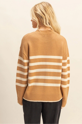 Taupe sweater with cream stripes, crew neckline, and easygoing fit. 