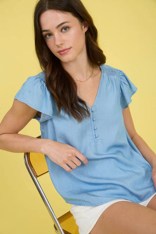 Blue Chambray Top with Ruffle Sleeves and V-Neck Button Closure
