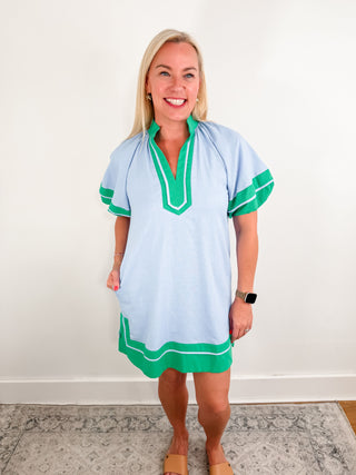 Solid contrast accented short lantern sleeves pullover mini dress with slit hem featuring a high neck split collar band.