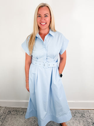 Solid stitch detailed short wing sleeve button front midi dress featuring adjustable fabric belt with buckle closure. Lined. Woven. Non-sheer. Lightweight.