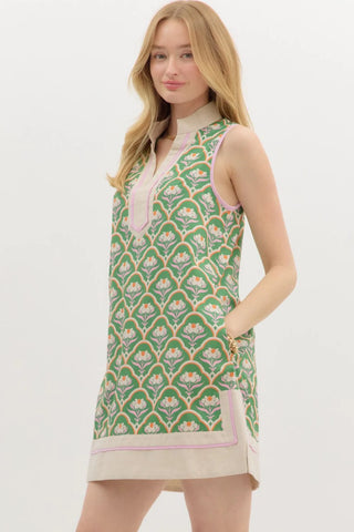Sleeveless Mini Dress with Green Floral Pattern, V-Neck, Contrast Border Trim, and Pockets