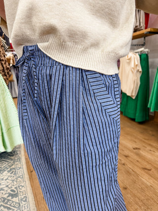 Navy and White Striped Wide-Leg Pants with Side Pockets and Elastic Waistband. Not Lined.