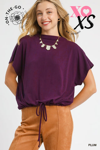 Plum Top with High Crew Neckline, Short dolman sleeves, Brushed fleece, Back keyhole, and Adjustable Bottom with Drawstring