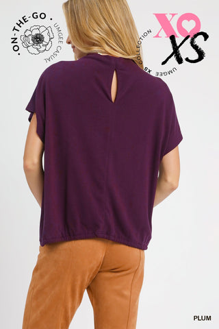 Plum Top with High Crew Neckline, Short dolman sleeves, Brushed fleece, Back keyhole, and Adjustable Bottom with Drawstring